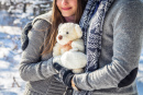 Young Couple in the Winter Forest