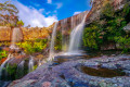 Hiking by a Waterfall