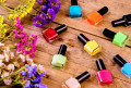 Bottles of Nail Polish and Flowers