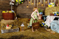 Little Girl with a Basket in a Rustic Interior