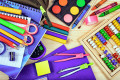 School Supplies on Wooden Background