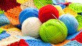 Yarn Balls and a Crochet Blanket