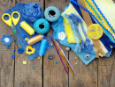 Needlework on a Wooden Background