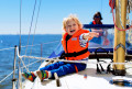 Little Boy Enjoys Yachting