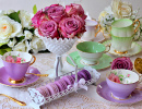 Vintage Tea Cup with Macarons and Roses