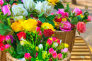 Artificial Flowers in a Vintage Wicker Basket