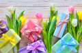 Festive Composition with Gift Boxes and Flowers