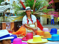 A Young Woman Weaving Hats in Cuenca, Ecuador