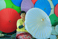 People Hand-Make and Paint Umbrellas, Thailand