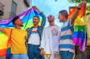Young Men with a Rainbow Flag