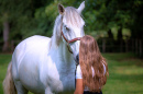 Brunette Woman with a White Horse