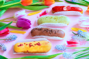 Delightful Eclairs and Vibrant Flowers
