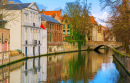 Picturesque Green Canal in Bruges, Belgium